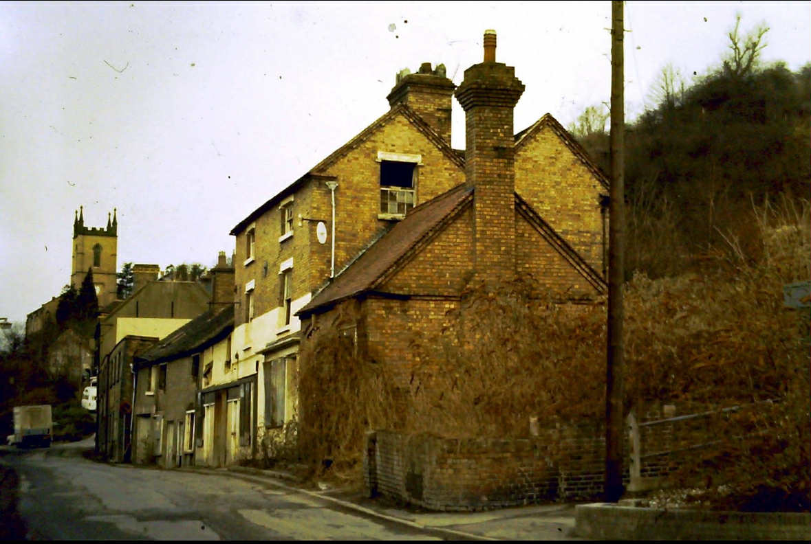 Empty and derelict buildings on Waterloo Street, St Luke's Church tower beyond